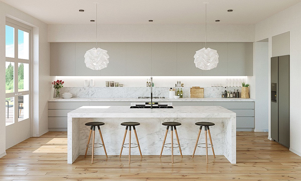 White kitchen cabinets with sleek modern design in a bright big kitchen with island.