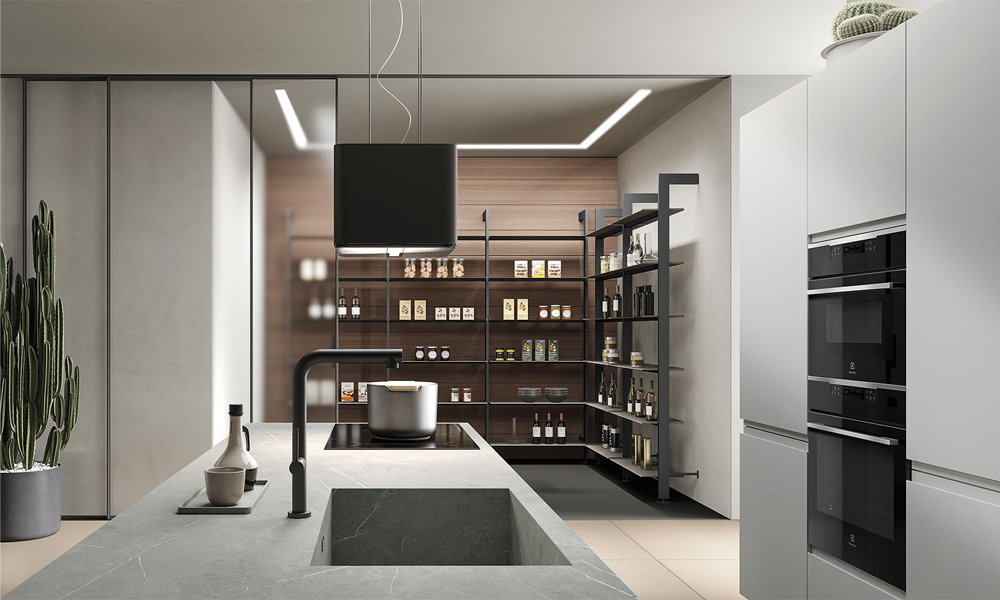 A close-up view of an L-shaped kitchen with dark gray lacquer cabinets and a central countertop, showcasing sleek modern design with a smooth, glossy finish and minimalist style. The countertop offers a clean and spacious work area, complementing the contemporary aesthetic.