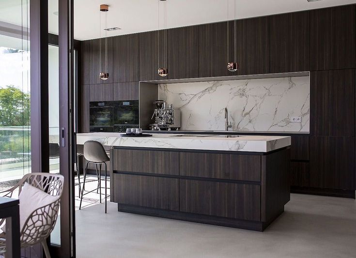 Modern 2026 kitchen with light oak wood veneer kitchen cabinets and brown island