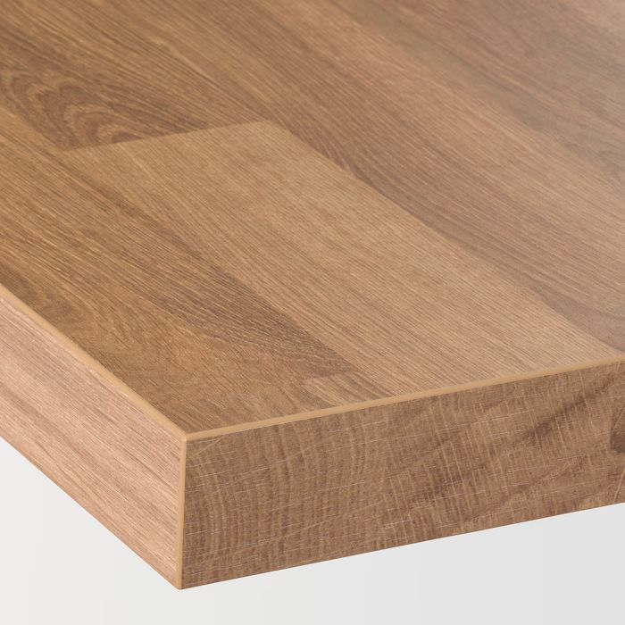 HPL laminate countertops with wood-look finish in a small kitchen.