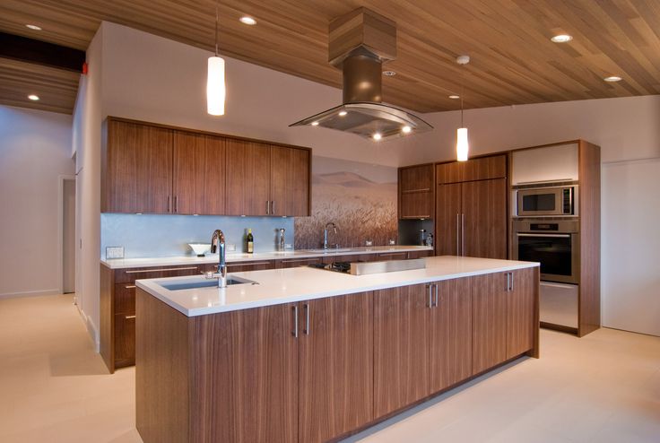 Two-tone design using wood veneer kitchen cabinets on base units and white wall cabinets