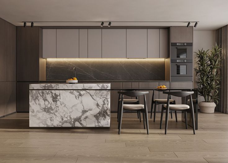 AIS Cabinet Two-tone kitchen island with navy cabinetry and wood countertop.