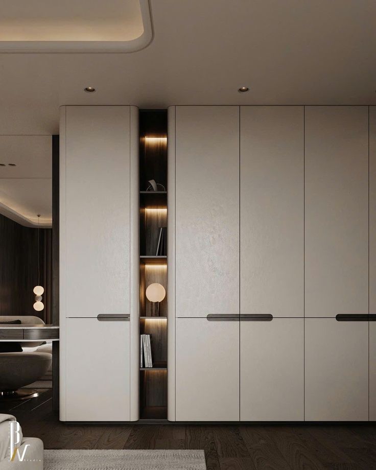 AIS Cabinet Minimalist wardrobe design with flat-panel doors and concealed handles.