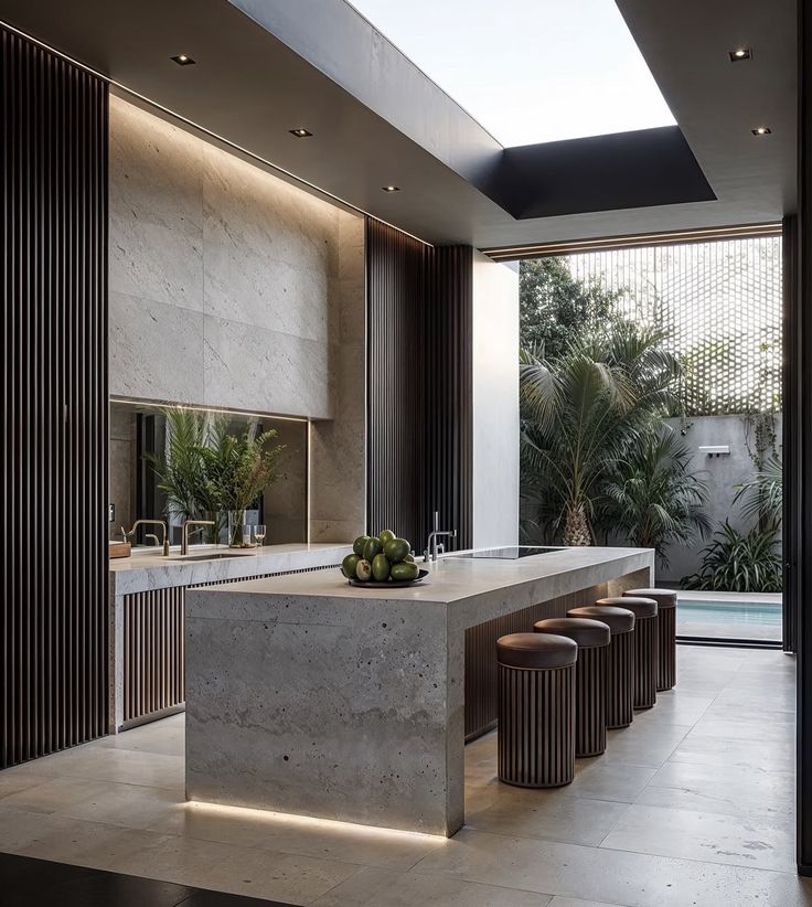 AIS Cabinet Kitchen island with extended countertop seating for three bar stools.